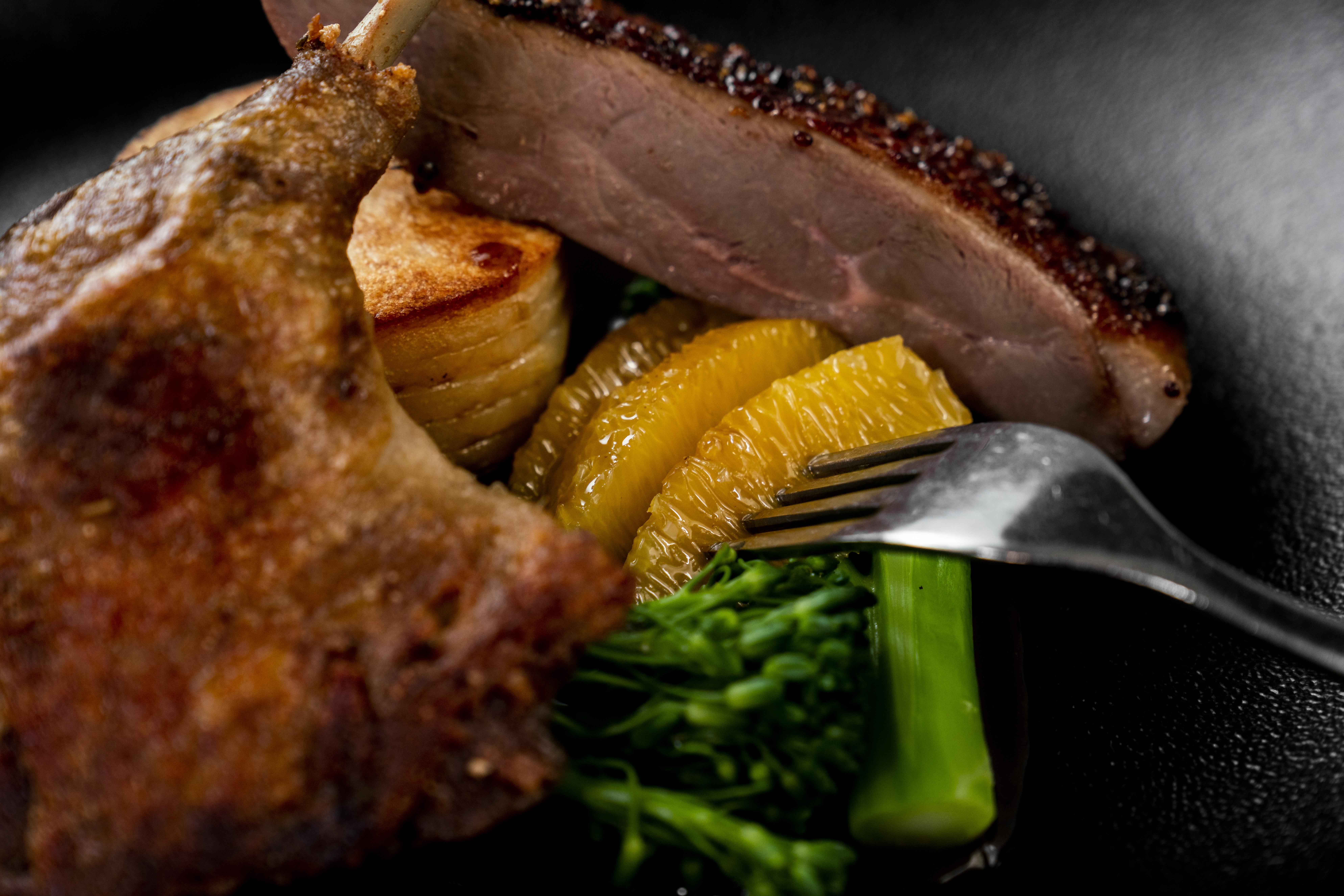 The Point Brisbane Hotel Bagian luar foto A duck confit with orange and vegetables